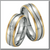 Серебряные обручальные кольца с золотыми вставками