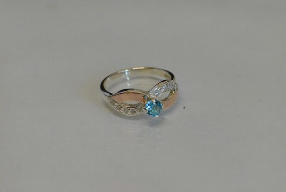 Серебряное кольцо с золотыми накладками 030к 15
