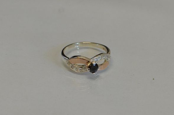 Серебряное кольцо с золотыми накладками 030к 15