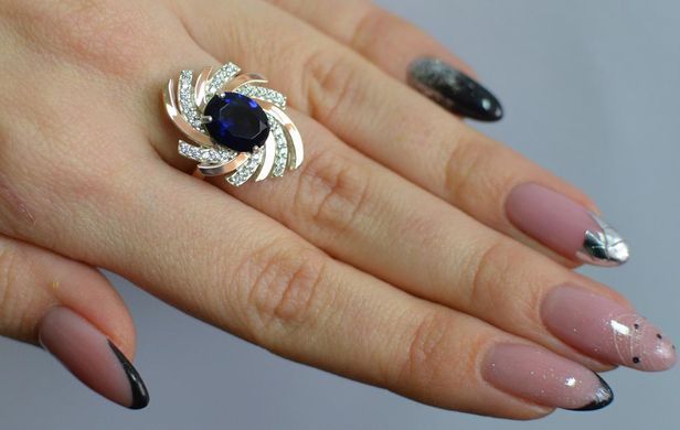 Серебряное кольцо с золотыми вставками 156к 15