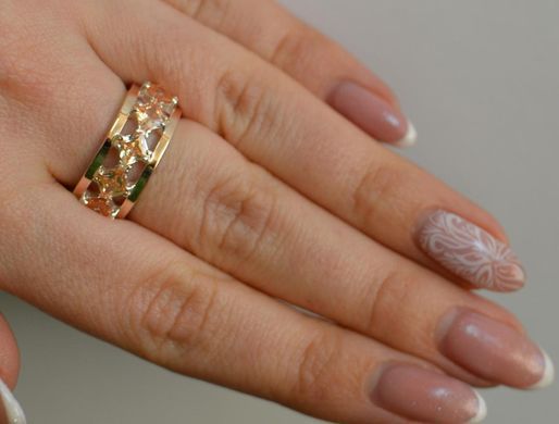 Серебряное кольцо с золотыми вставками 15
