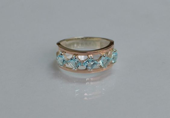 Серебряное кольцо с золотыми вставками 15