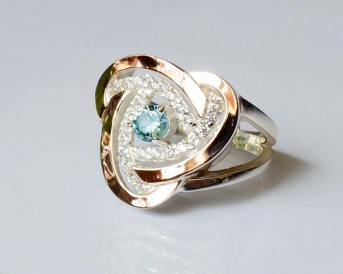 Серебряное кольцо с золотыми вставками 178к 15