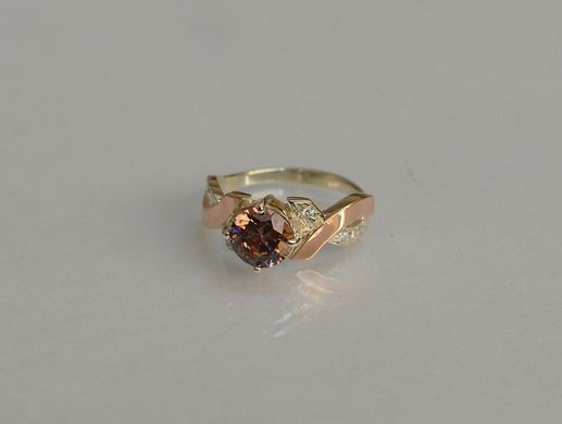 Серебряное кольцо с напайками из золота 033к 21