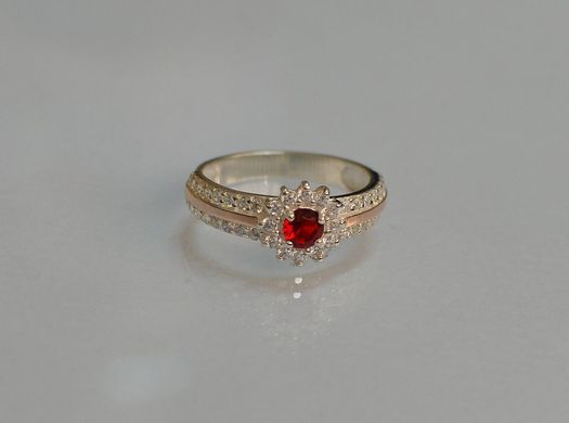 Серебряное кольцо с золотыми вставками 175к 15