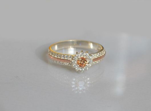 Серебряное кольцо с золотыми вставками 175к 15
