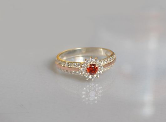 Серебряное кольцо с золотыми вставками 175к 15