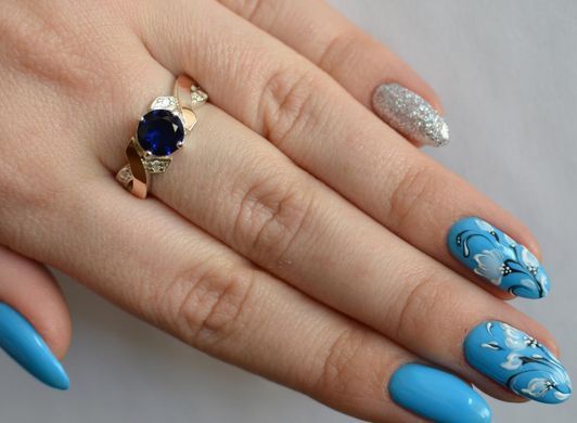 Серебряное кольцо с напайками из золота 033к 21