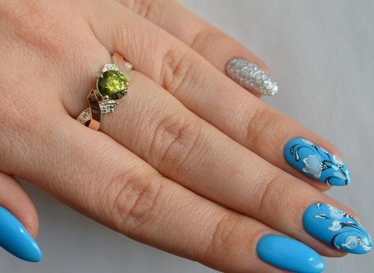 Серебряное кольцо с напайками из золота 033к 21