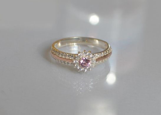 Серебряное кольцо с золотыми вставками 175к 15