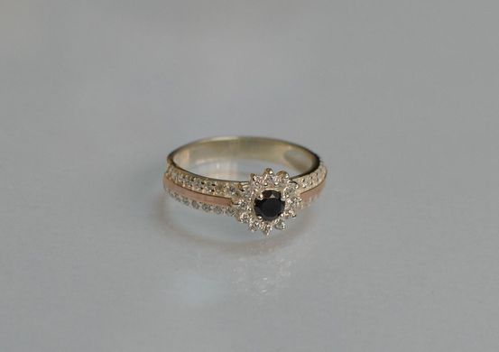 Серебряное кольцо с золотыми вставками 175к 15