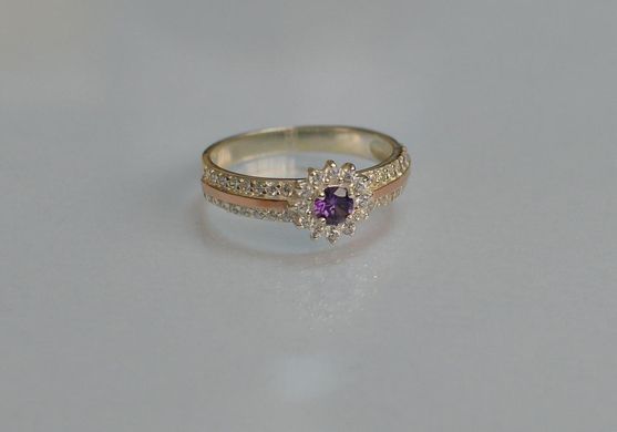 Серебряное кольцо с золотыми вставками 175к 15