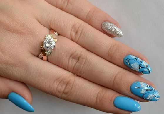 Серебряное кольцо с напайками из золота 033к 21