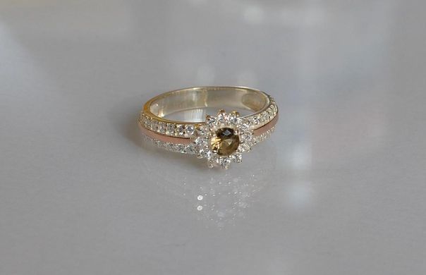 Серебряное кольцо с золотыми вставками 175к 15