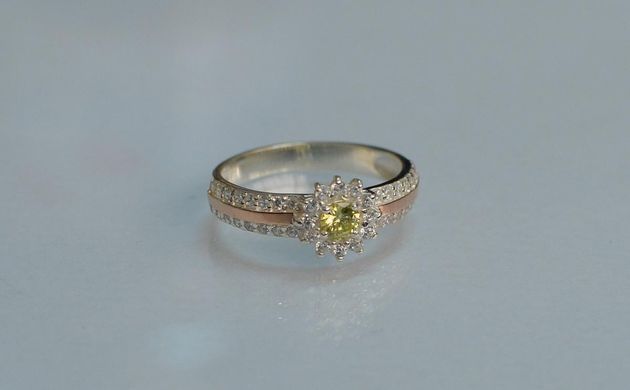 Серебряное кольцо с золотыми вставками 175к 15