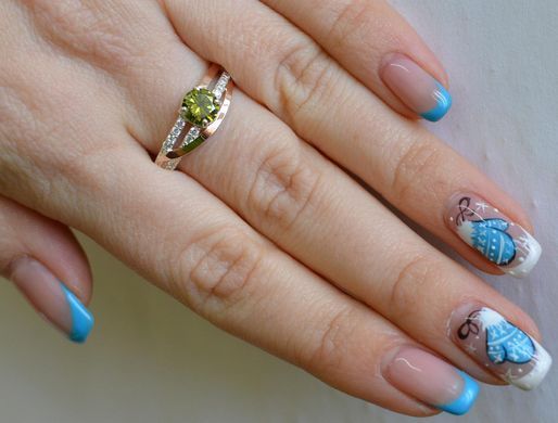 Серебряное кольцо с золотыми вставками 108к 15