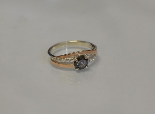 Серебряное кольцо с золотыми вставками 108к 15