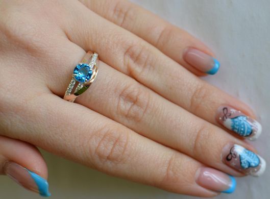 Серебряное кольцо с золотыми вставками 108к 15