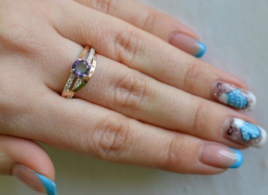 Серебряное кольцо с золотыми вставками 108к 15