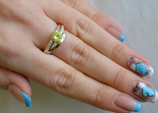 Серебряное кольцо с золотыми вставками 108к 15