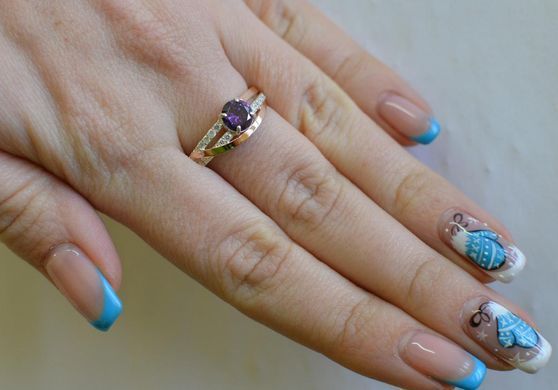 Серебряное кольцо с золотыми вставками 108к 15