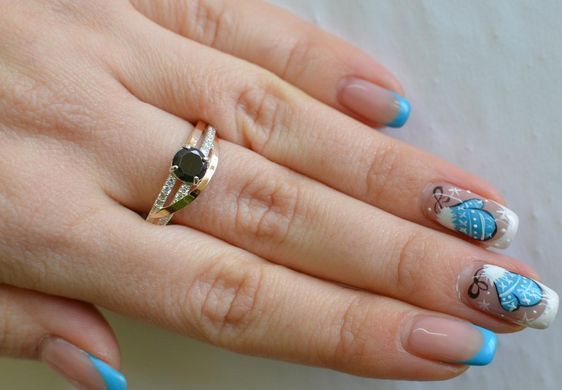 Серебряное кольцо с золотыми вставками 108к 15
