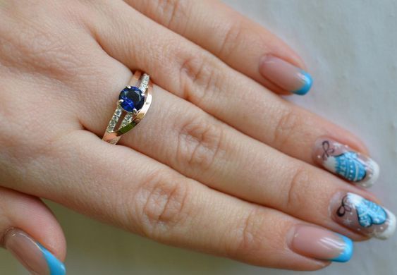 Серебряное кольцо с золотыми вставками 108к 15
