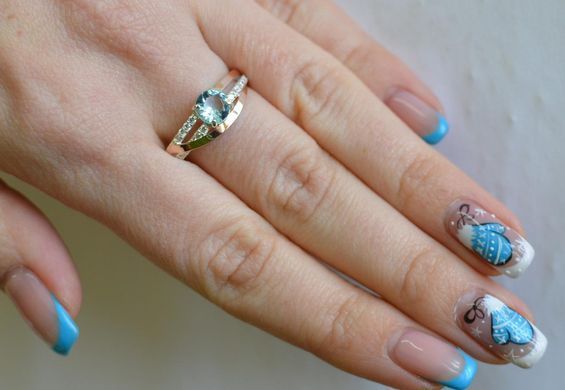 Серебряное кольцо с золотыми вставками 108к 15
