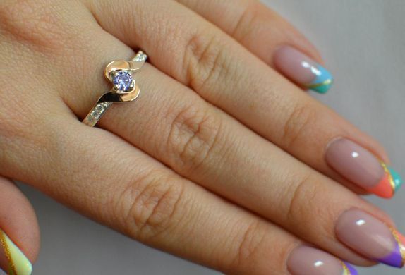 Серебряное кольцо с золотыми вставками 142к 15