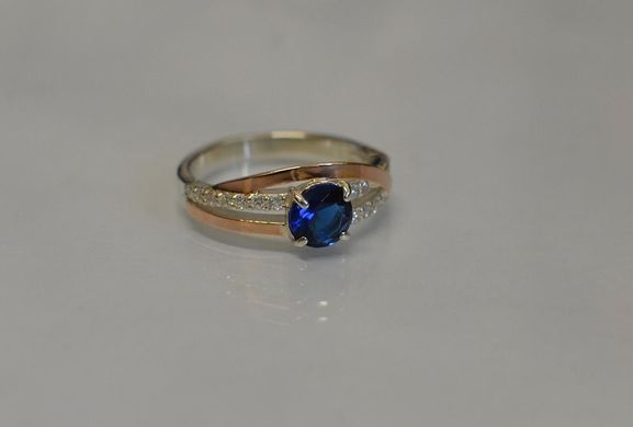Серебряное кольцо с золотыми вставками 108к 15