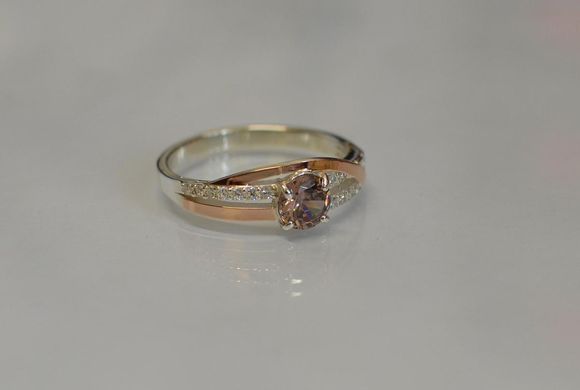 Серебряное кольцо с золотыми вставками 108к 15