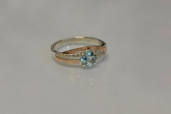 Серебряное кольцо с золотыми вставками 108к 15
