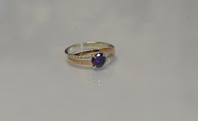 Серебряное кольцо с золотыми вставками 108к 15