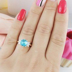 Серебряное кольцо с золотыми вставками размер 17 545/г к голубой