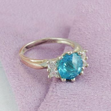 Серебряное кольцо с золотыми вставками размер 17 545/г к голубой