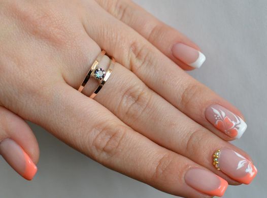 Серебряное кольцо с пластинами из золота 004к 15