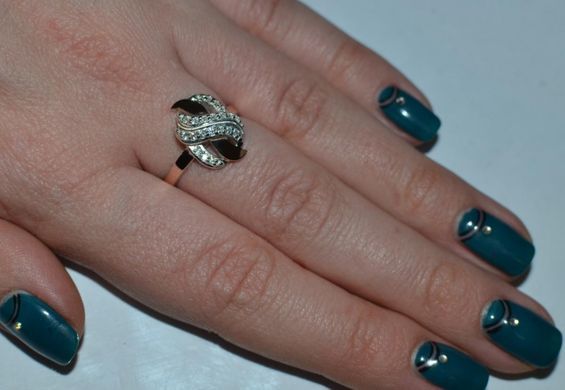 Серебряное кольцо с напайками из золота 060к 15
