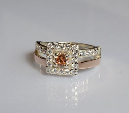 Серебряное кольцо с золотыми вставками 179к 15