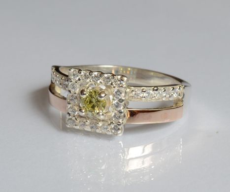 Серебряное кольцо с золотыми вставками 179к 15