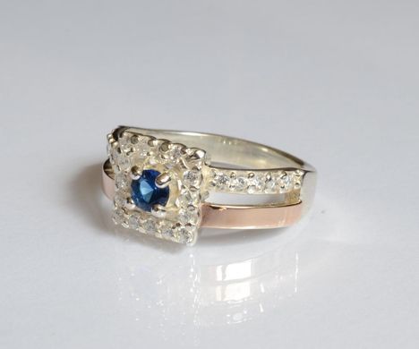 Серебряное кольцо с золотыми вставками 179к 15