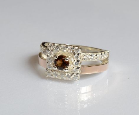 Серебряное кольцо с золотыми вставками 179к 15