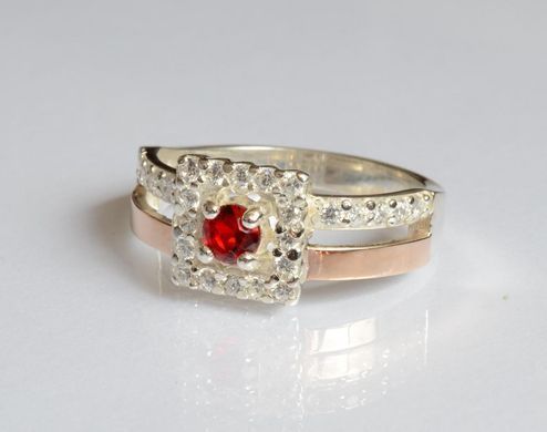 Серебряное кольцо с золотыми вставками 179к 15