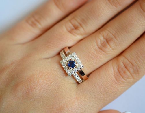 Серебряное кольцо с золотыми вставками 179к 15