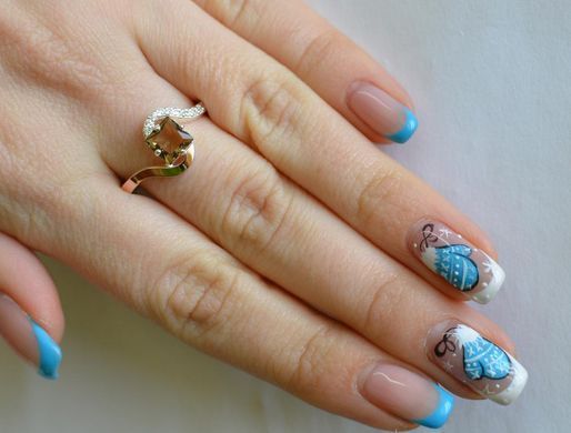 Серебряное кольцо с золотыми накладками 118к 15