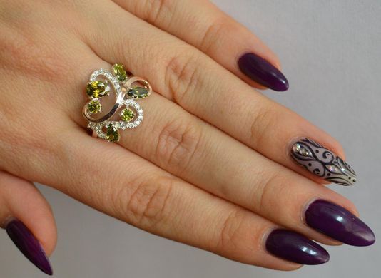 Серебряное кольцо с золотыми вставками 151к 15