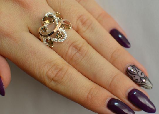 Серебряное кольцо с золотыми вставками 151к 15