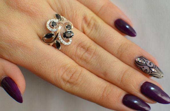 Серебряное кольцо с золотыми вставками 151к 15