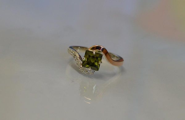 Серебряное кольцо с золотыми накладками 118к 15