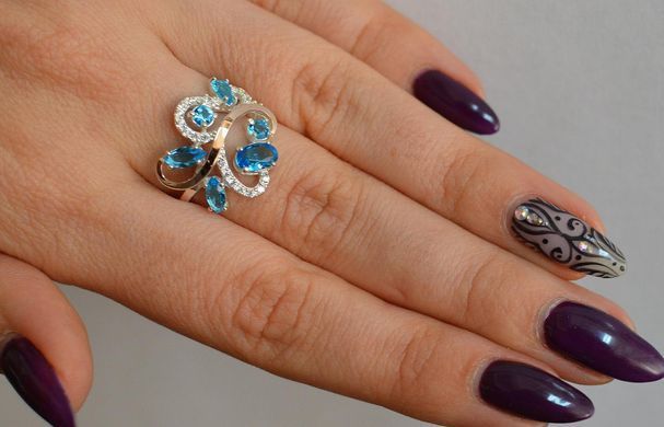 Серебряное кольцо с золотыми вставками 151к 15