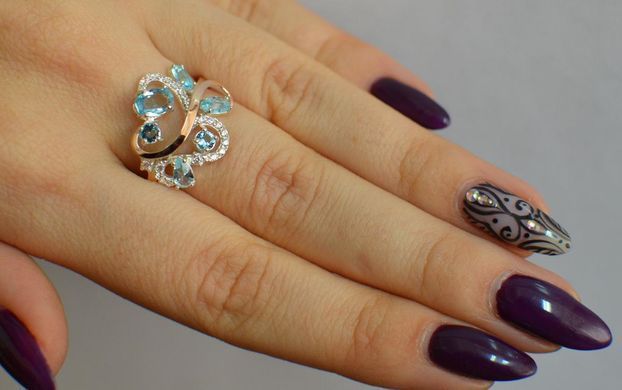 Серебряное кольцо с золотыми вставками 151к 15
